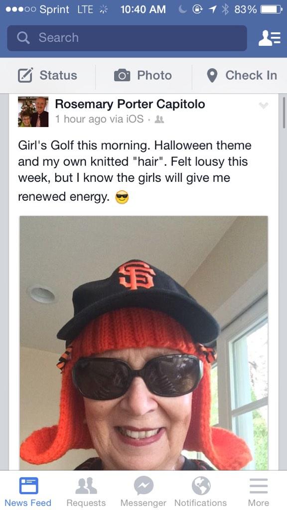 Showing cancer who's boss by knitting a bright orange wig!