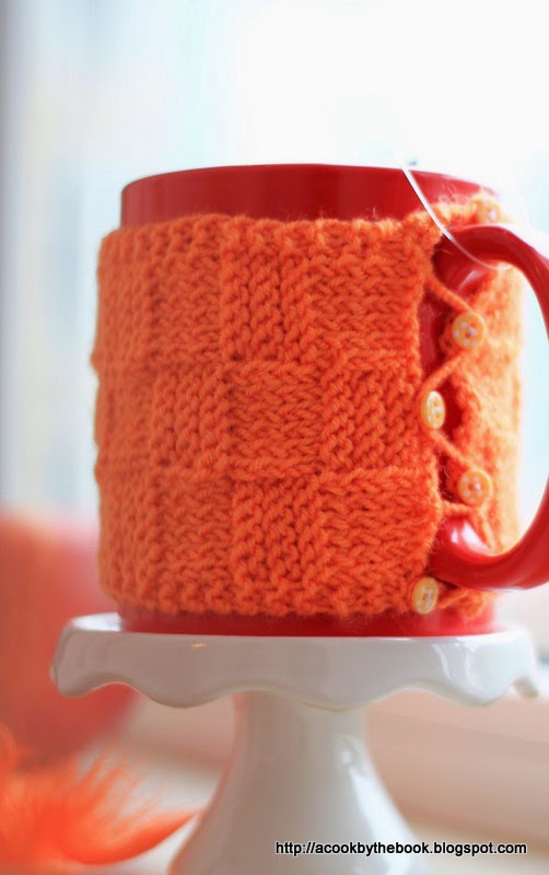 Knit a pretty mug cozy in basketweave stitch.