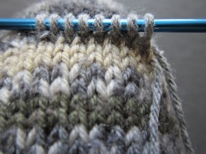 how to fix a hole in a sock with a knit on patch.