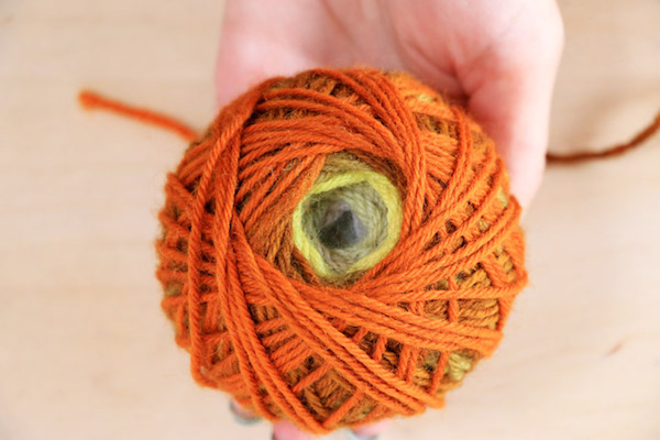 Make a magic yarn ball with needle felting