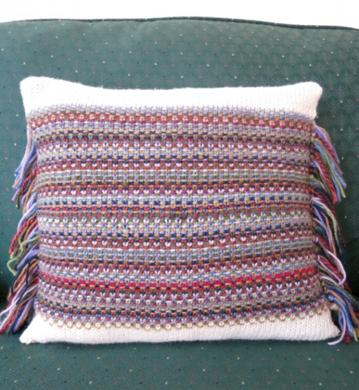 Knit a pillow with odd balls and use the ends as fringe.