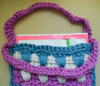 Add a no-sew liner to your knit bags with duct tape.