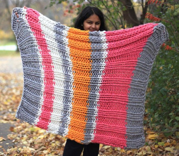 Knit a super bukly striped blanket in no time.