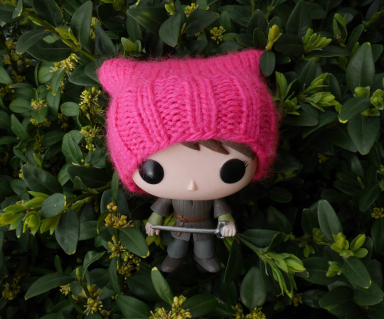 Knit a tiny pussy cat hat for a Funko Pop doll.