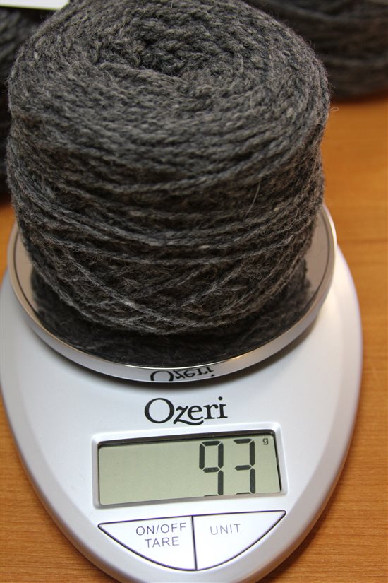 weighing yarn to determine yardage