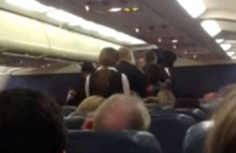 woman escorted off plane after fight with knitter