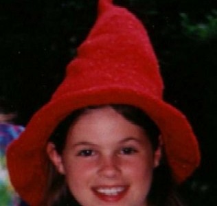 Knit a simple witch hat with whatever yarn you have lying around.
