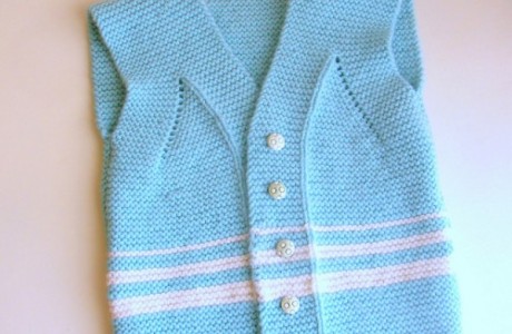 Knit a super cute garter stitch vest for a 12 to 18 month old.