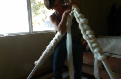 Knitter used giant roving, PVC needles to knit huge blanket