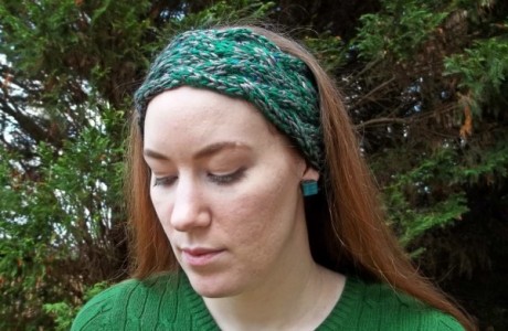 This pretty braided cable headband can be knit in an hour or less.
