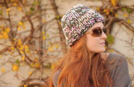 Knit a hat on the double with three strands of yarn held together.