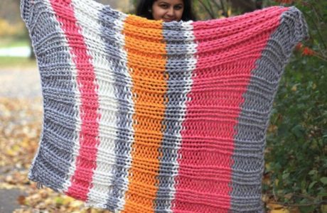 Knit a super bukly striped blanket in no time.