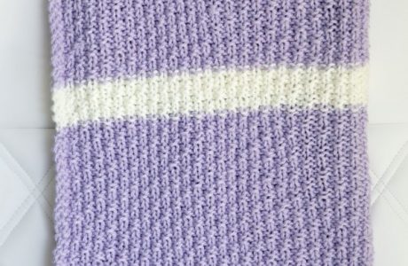 An easy textured and striped baby blanket to knit.