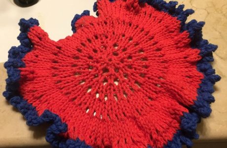 Knit a frilly circle dishcloth with Knitted Kitchen.