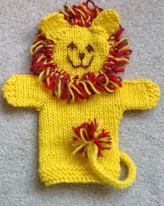 knit lion puppet