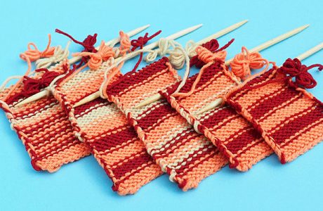 methods for carrying yarn up the side of a knitting project